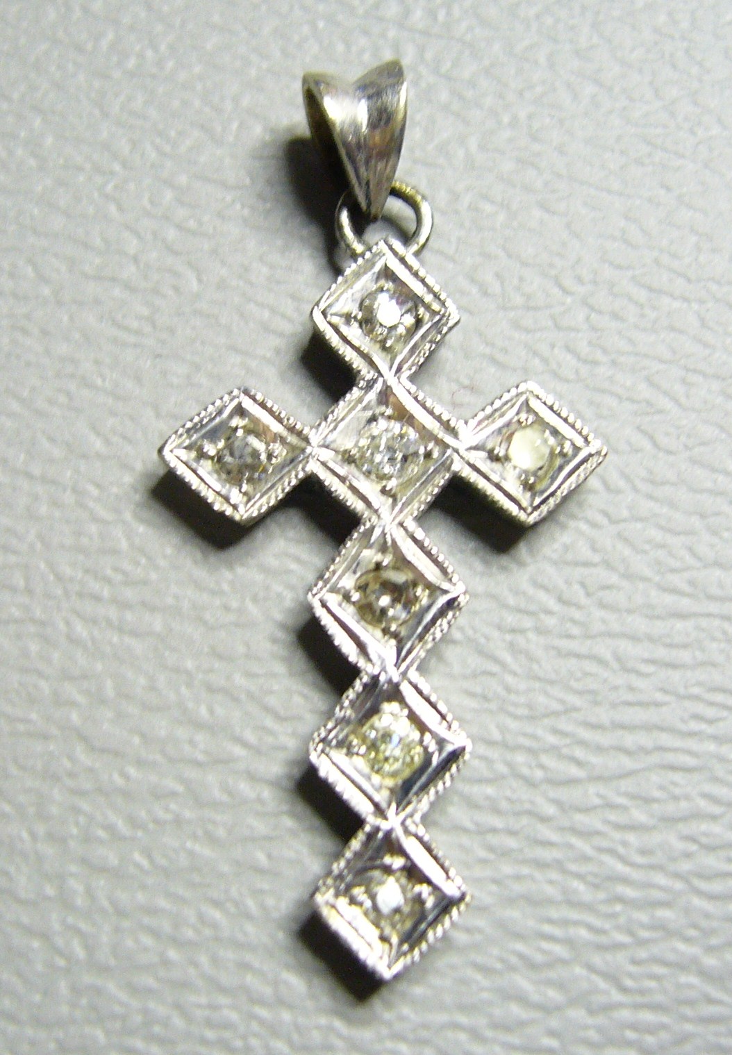 CROSS WITH 1/2ctw DIAMONDS IN 14KT SOLID WHITE GO